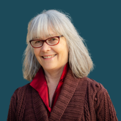 author headshot of Claudia L'Amoreaux